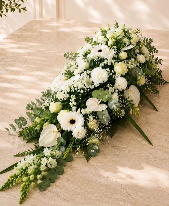 Blanc Éternel — fleurs de deuil livrées à Lyon